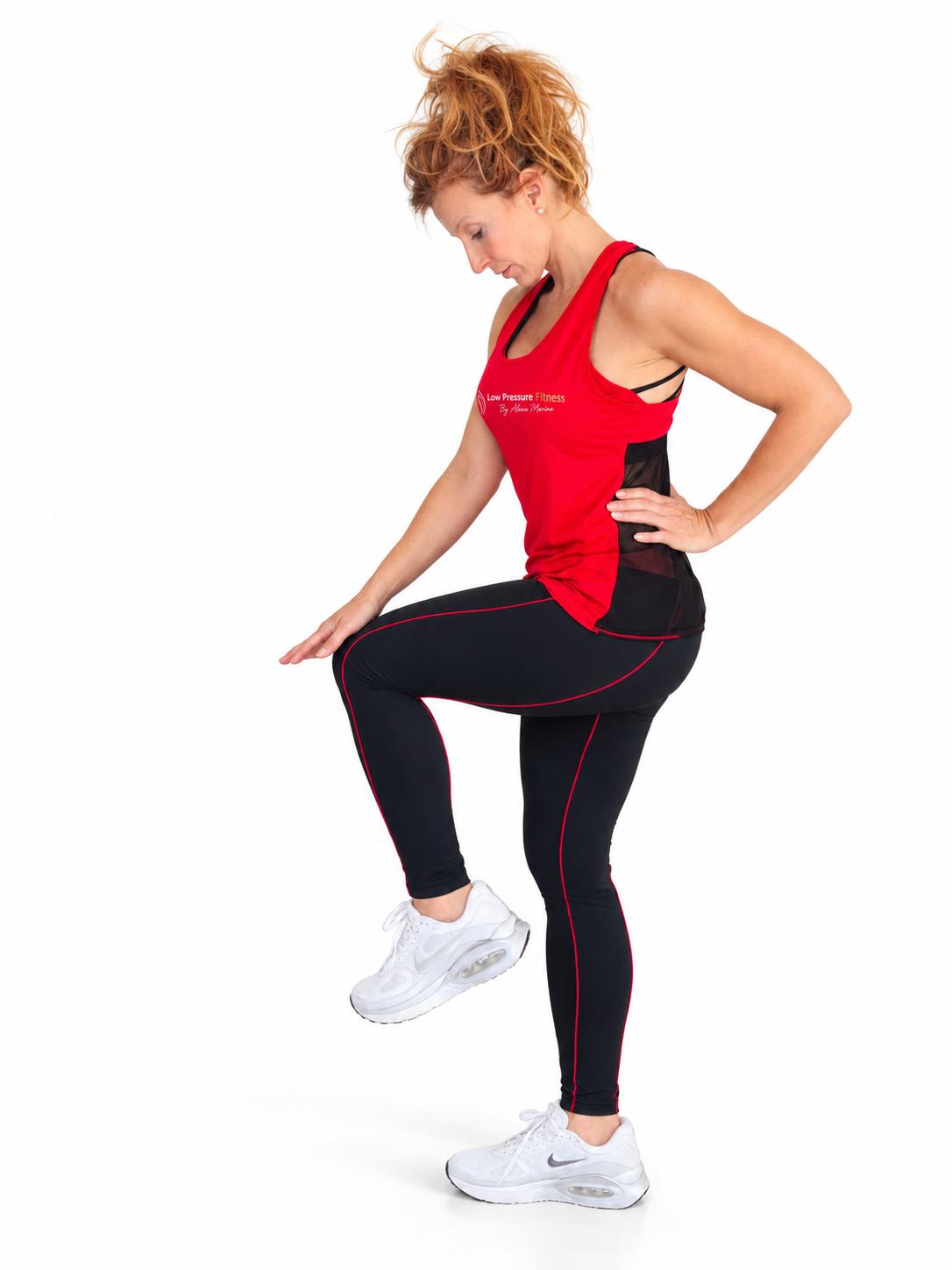 Red tank top worn with black Elements leggings